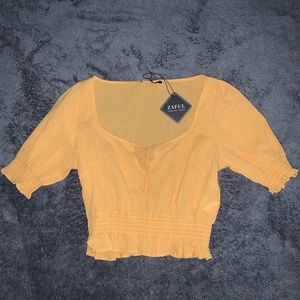 yellow loose fitted crop top